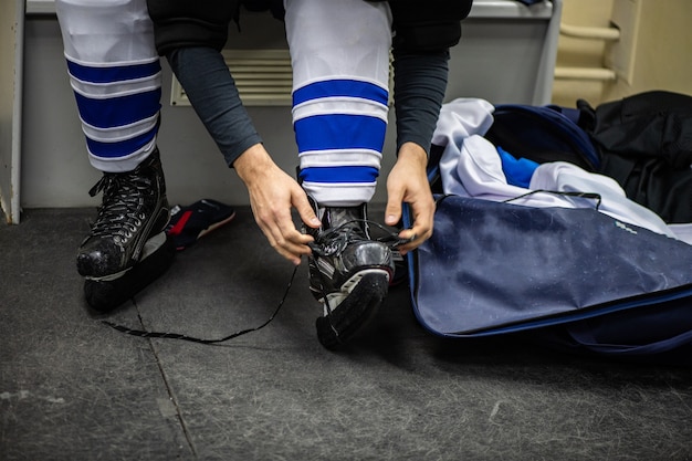 Hockey sticks in locker rooms before the game