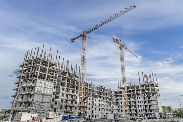 Hoisting crane and new multi-storey building