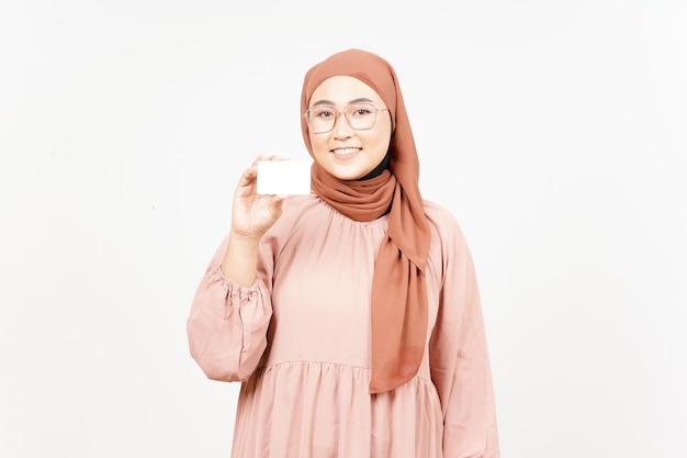 Holding Blank Bank Card Or Credit Card of Beautiful Asian Woman Wearing Hijab Isolated On White