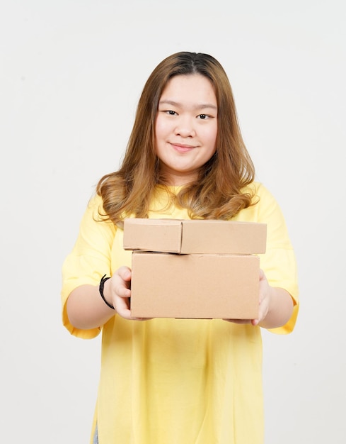 Holding Package Box or Cardboard Box of Beautiful Asian Woman wearing yellow TShirt