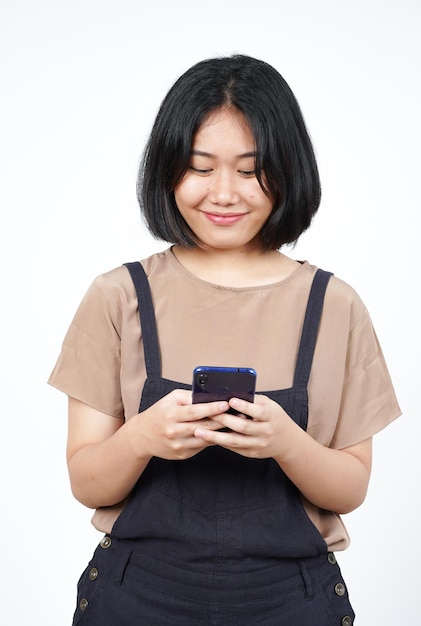 Holding or Using Smartphone and Smile of Beautiful Asian Woman Isolated On White Background