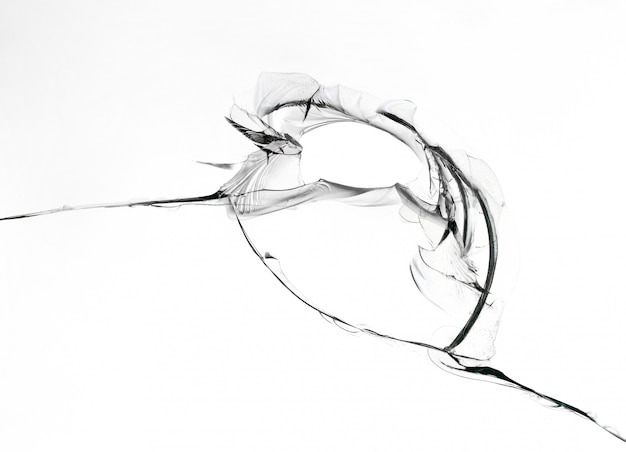 Hole with cracks in glass texture on white backgraound.