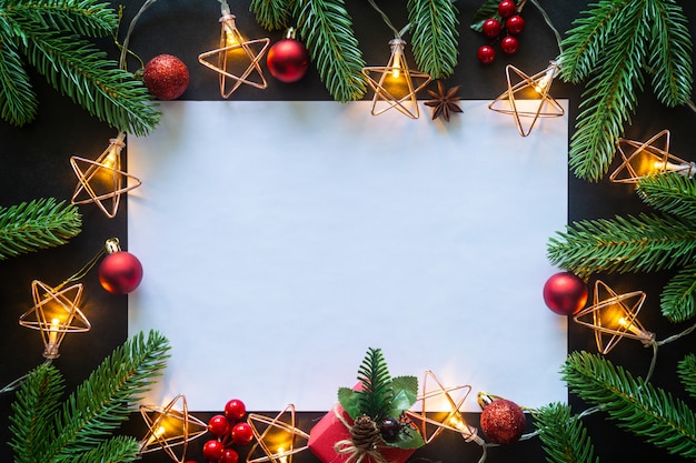 Holiday Christmas festive decoration on a black background from Flat lay.