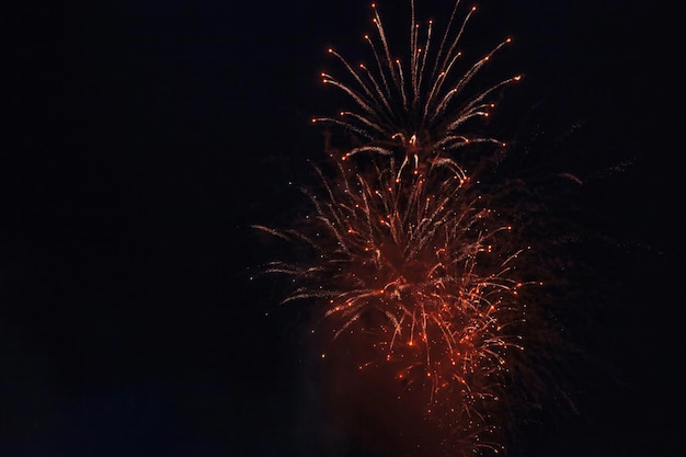 Holiday fireworks backgrounds with sparks colored stars and bright