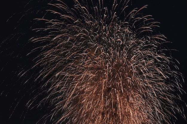 Holiday fireworks backgrounds with sparks colored stars and bright