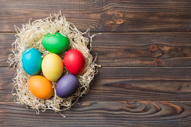 Holiday preparation Multi colors Easter eggs on colored background Pastel color Easter eggs holiday concept with copy space