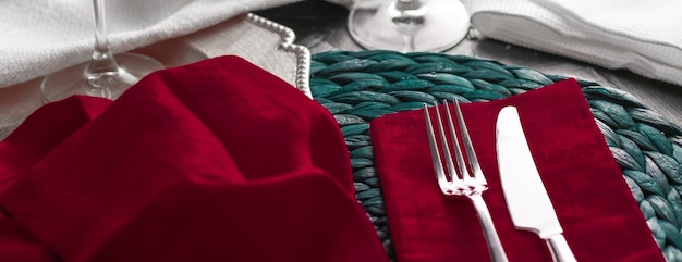 Holiday table setting with red napkin and silver cutlery food styling props vintage set for wedding event date party or luxury home decor brand design