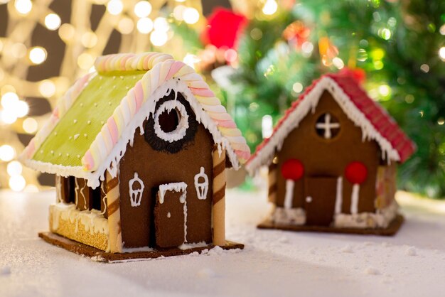 holidays, christmas, baking and sweets concept - closeup of beautiful gingerbread house on table