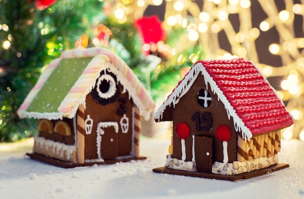 holidays, christmas, baking and sweets concept - closeup of beautiful gingerbread house on table