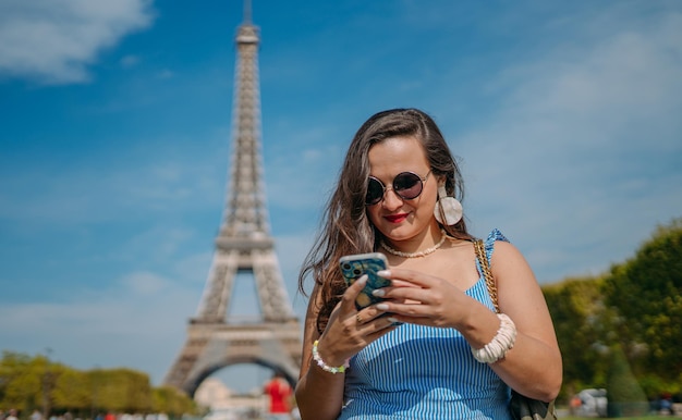 Holidays in Paris Young girl enjoying Paris France Summer vacation in Europe Eiffel Tower