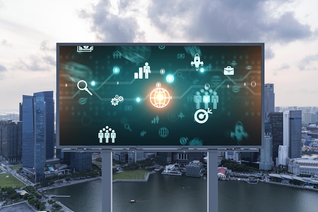 Hologram of Research and Development glowing icons on billboard Sunset panoramic city view of Singapore Concept of innovative technologies to create new services and products in Southeast Asia