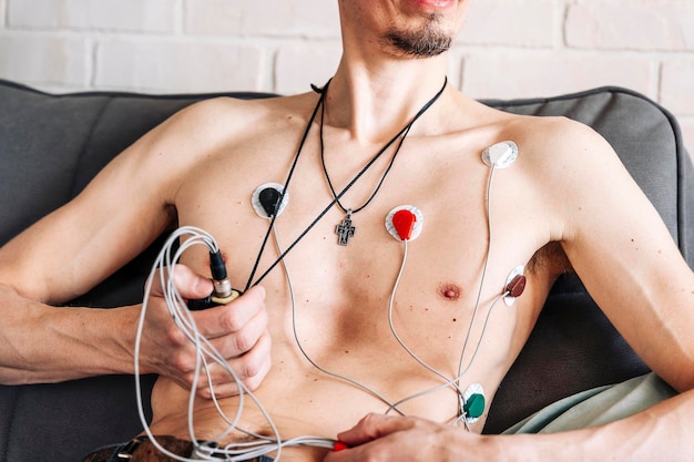 Holter Heart Monitor man with cardio monitor