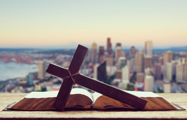 Holy Bible book and cross, close-up view