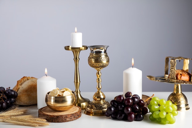 Holy communion with chalice and grapes