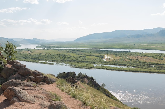 holy mountain with view on valley and river