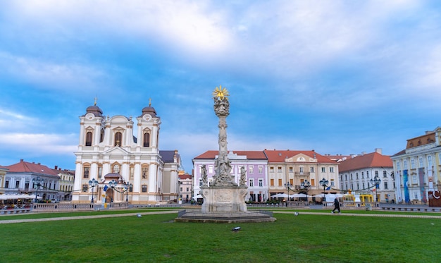 Holy trinity column and Roman catholic cathedral at the union square in romanian city Timisoara