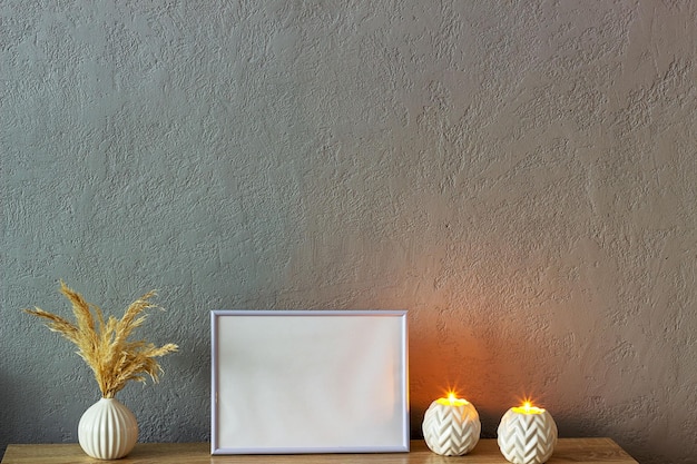 Home decor mockup blank photo frame near gray painted concrete wall Place for your text