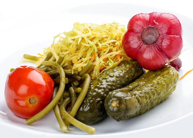 Home marinated vegetables on a white background