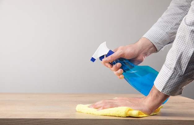 Home table cleaning, table surface disinfection with a disinfectant spray