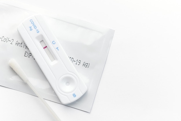 Home testing kit for coronavirus on a white background