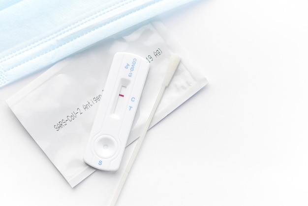 Home testing kit for coronavirus on a white background