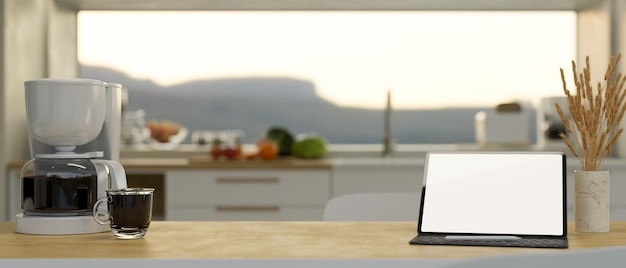 Home workspace Tablet mockup and coffee maker on wood table in modern kitchen