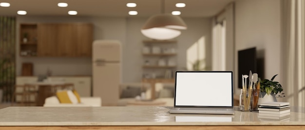 Home workspace with laptop mockup over blurred background of modern contemporary kitchen