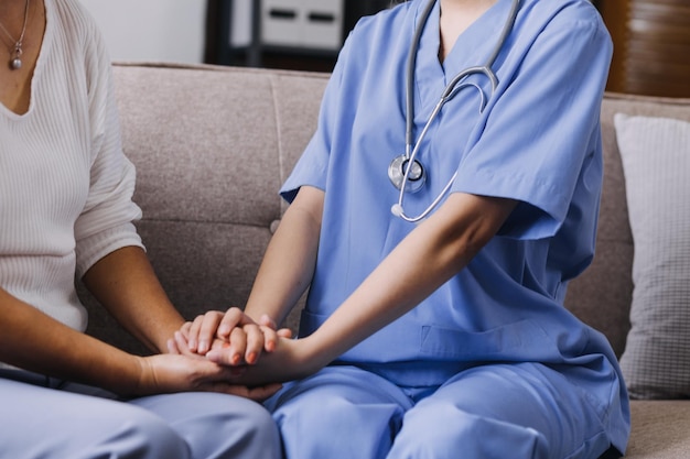 Homecare nursing service and elderly people cardiology healthcare Close up of young hispanic female doctor nurse check mature caucasian man patient heartbeat using stethoscope during visit