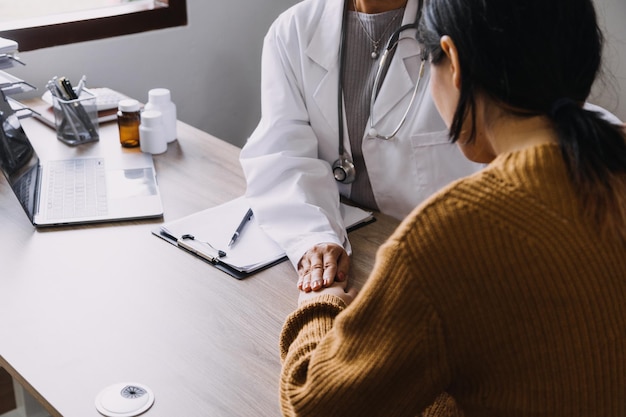 Homecare nursing service and elderly people cardiology healthcare Close up of young hispanic female doctor nurse check mature caucasian man patient heartbeat using stethoscope during visit