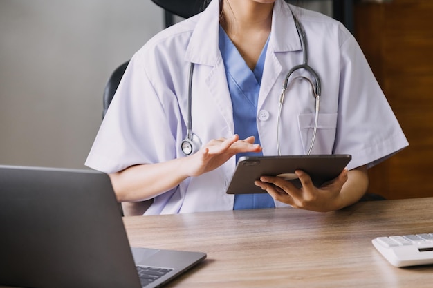 Homecare nursing service and elderly people cardiology healthcare Close up of young hispanic female doctor nurse check mature caucasian man patient heartbeat using stethoscope during visit