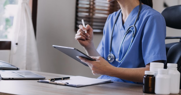 Homecare nursing service and elderly people cardiology healthcare Close up of young hispanic female doctor nurse check mature caucasian man patient heartbeat using stethoscope during visit