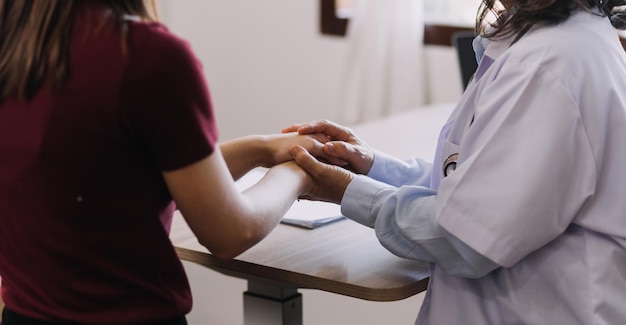 Homecare nursing service and elderly people cardiology healthcare Close up of young hispanic female doctor nurse check mature caucasian man patient heartbeat using stethoscope during visit