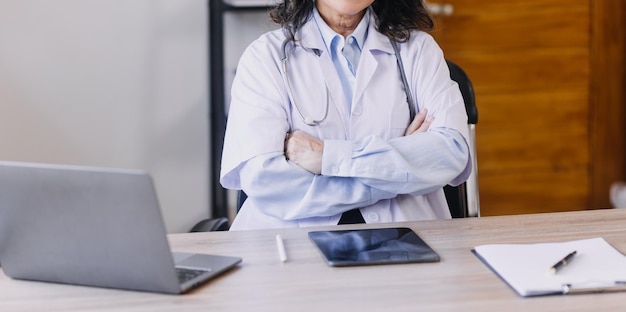 Homecare nursing service and elderly people cardiology healthcare Close up of young hispanic female doctor nurse check mature caucasian man patient heartbeat using stethoscope during visit