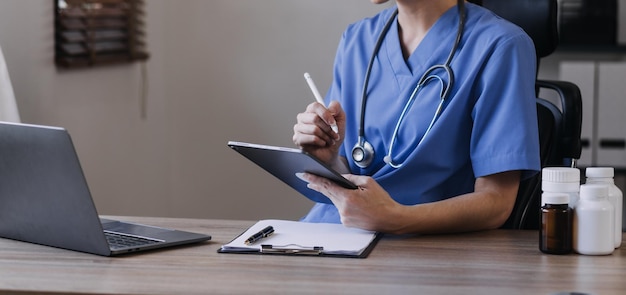 Homecare nursing service and elderly people cardiology healthcare Close up of young hispanic female doctor nurse check mature caucasian man patient heartbeat using stethoscope during visit