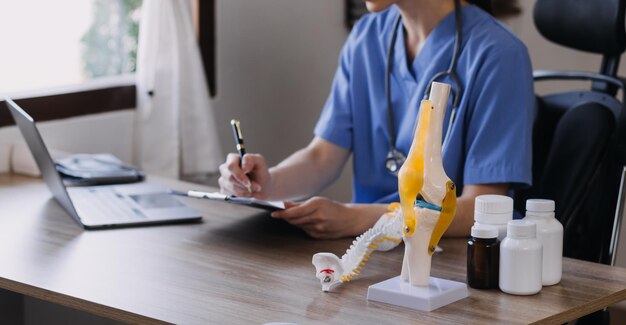 Homecare nursing service and elderly people cardiology healthcare Close up of young hispanic female doctor nurse check mature caucasian man patient heartbeat using stethoscope during visit