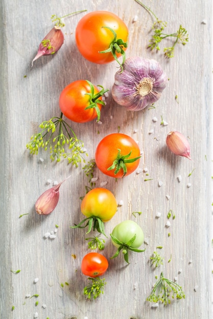 Homegrown pickled red tomatoes in the jar