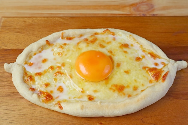 Homemade Adjarian Khachapuri Cheese and Egg Filled Traditional Georgian Bread