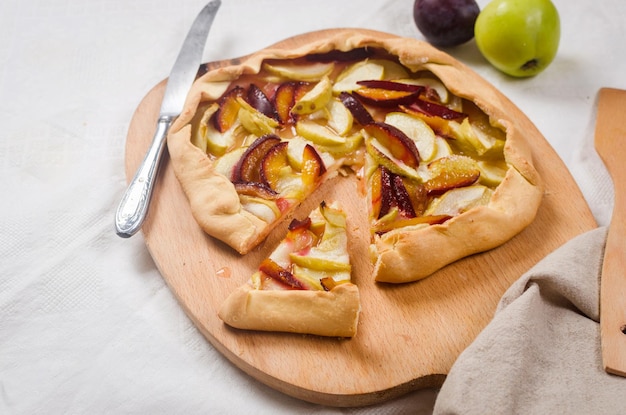 Homemade apple and plum galette table for teatime