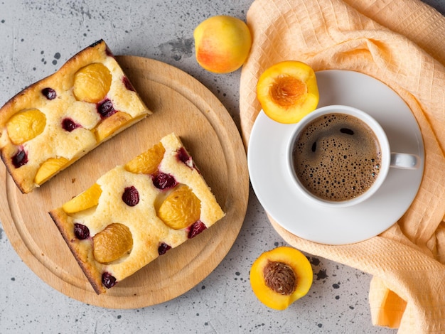 Homemade apricot pie top view espresso coffee cup