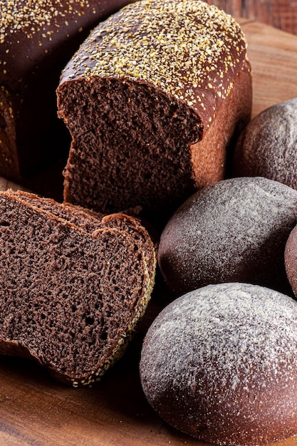 Homemade Australian bread with dark wholemeal flour on wooden board