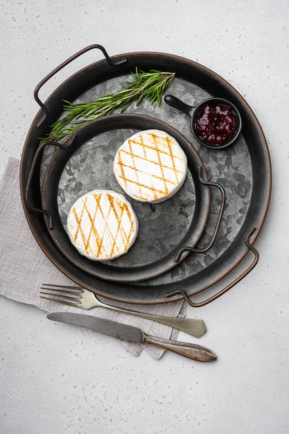 Homemade Baked Camembert cheese on gray stone table background top view flat lay