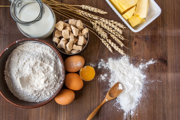 Homemade baking background, with baking ingredients. On a wooden background, top view