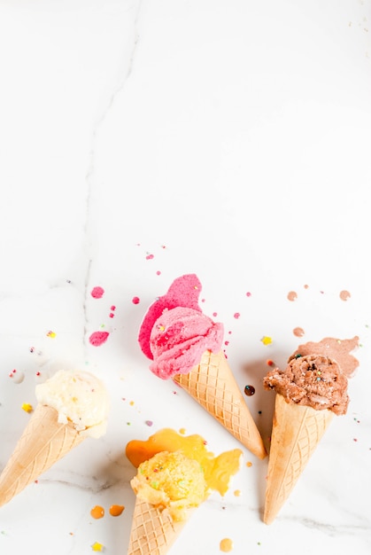 Homemade berry and chocolate ice cream in waffle cones