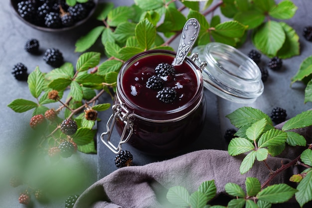 Homemade blackberry jam or confiture cooking preserving at home