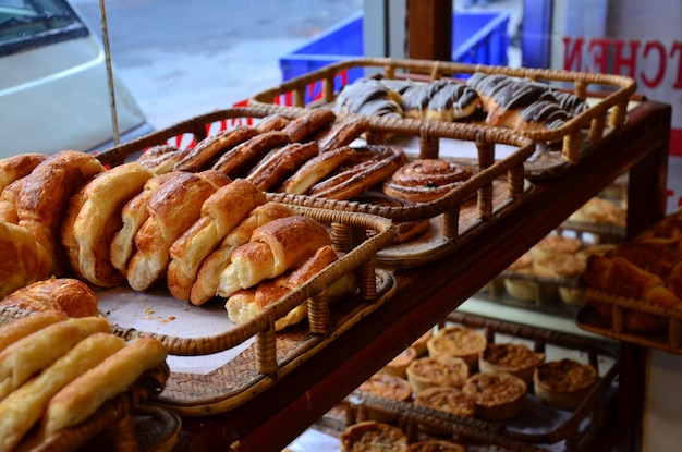 Homemade bread bun and cake sweet dessert bakery shop of nepalese for nepali people and foreign travelers select buy eat drinks in street bazaar market at thamel old town in Kathmandu valley of Nepal