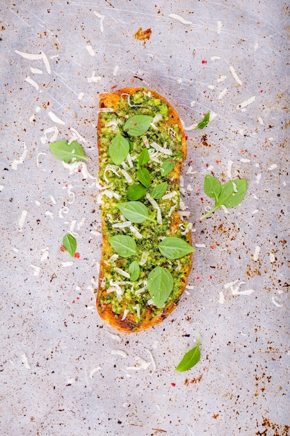 Photo homemade bruschetta with pesto sauce basil and parmesan