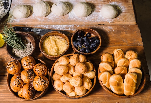 Homemade buns in a beautiful wooden cup Fresh dough for buns