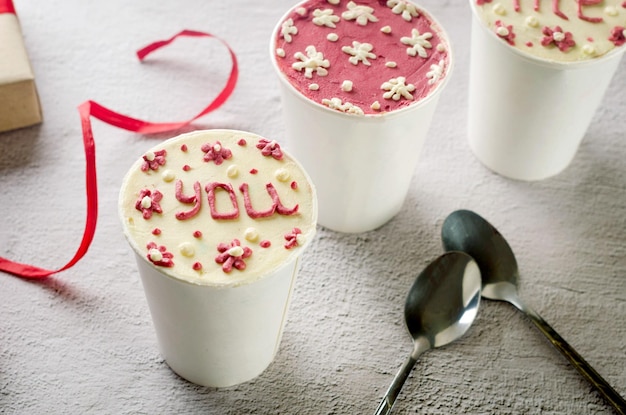 Homemade cake to go in white disposable coffee cups new confectionery trend