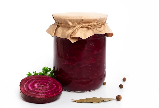 Homemade caviar from beets onions on a white background Canning of beetshome canning of red beets for the winter