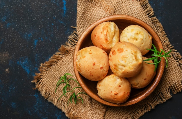 Homemade cheese buns rustic style vintage wooden background top view